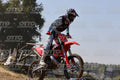 GAS GAS RED - LIGHT BLUE WHITE SUIT - BLACK BLUE RED HELMET · JD9A3990