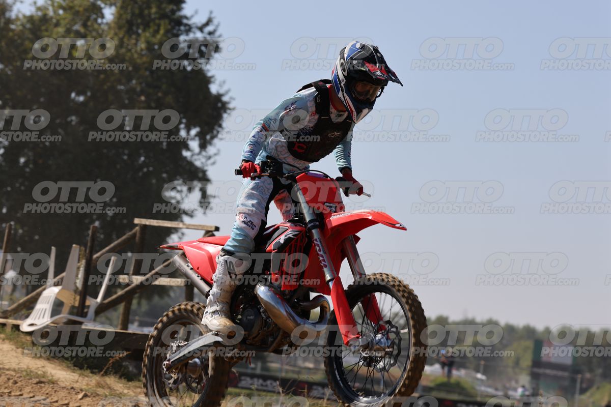 GAS GAS RED - LIGHT BLUE WHITE SUIT - BLACK BLUE RED HELMET · JD9A3990